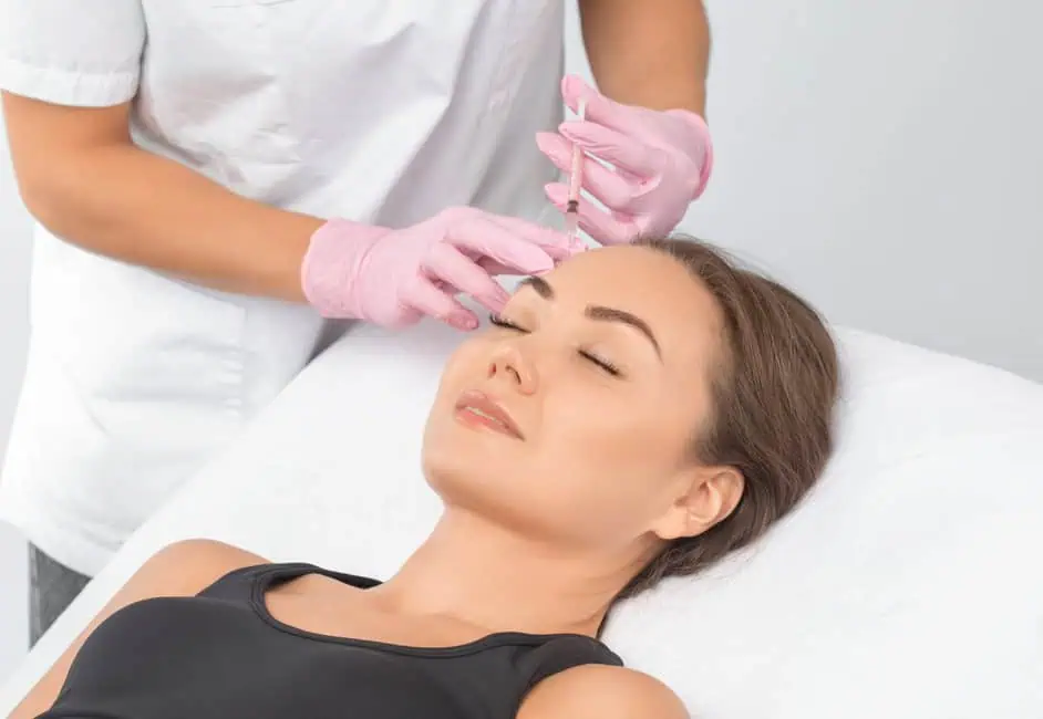 Woman receiving dermal filler treatment at Artmedica Aesthetics in Vienna, VA