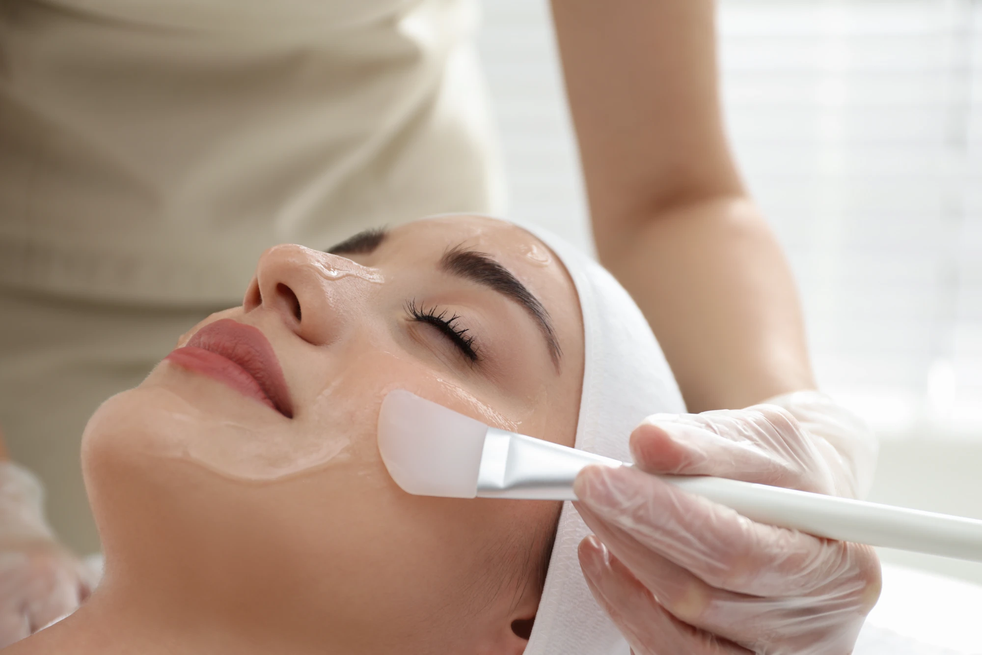 Woman receiving facial treatment at Artmedica Medspa in Vienna, VA
