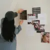 Woman pinning aesthetic mood board at Artmedica Vienna, VA